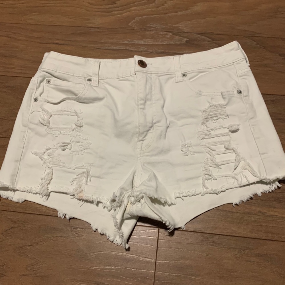 American Eagle white ripped and repaired shorts